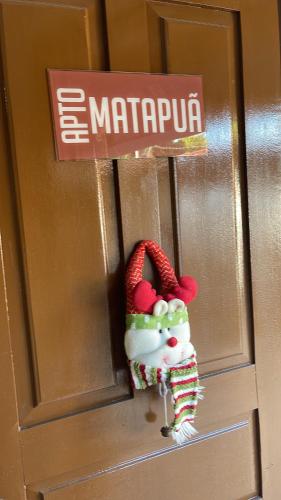 a door knob with a marmite sign on it at Residencial Temporada Aracaju in Aracaju