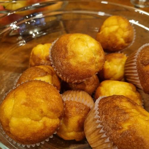 a glass bowl filled with donuts and muffins at HOTEL RURAL LA ROMEROSA in Riaza