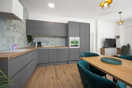 Kuchyň nebo kuchyňský kout v ubytování Luxury apartments Lotus&Lovor