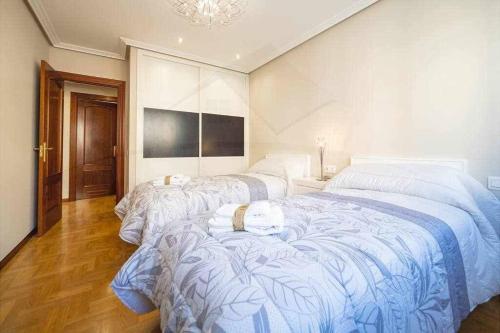 A bed or beds in a room at El Cuquiellu