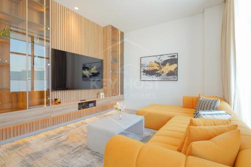 Posezení v ubytování KeyHost - Newly Furnished 2BR Apartment in Meydan - Dubai - K350