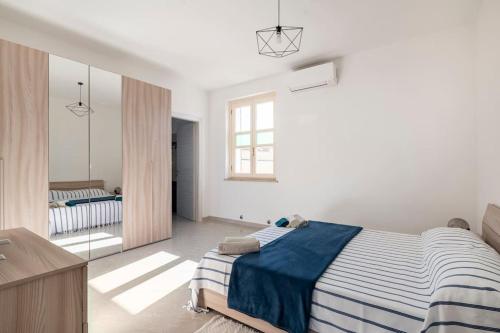 Postel nebo postele na pokoji v ubytování A Casa di Gi