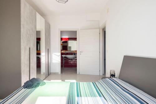 Ένα ή περισσότερα κρεβάτια σε δωμάτιο στο A Casa di Gi