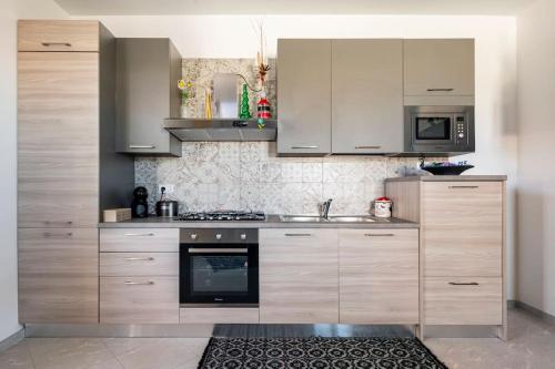 Η κουζίνα ή μικρή κουζίνα στο A Casa di Gi