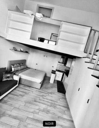 an overhead view of a living room with a couch at Eden Rooms in La Spezia