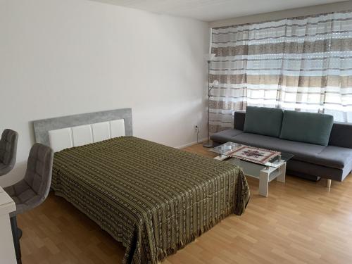 Rúm í herbergi á Ferienappartment Möhnesee