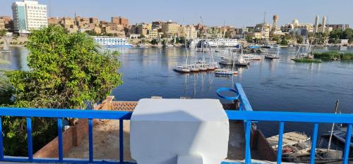 a view of a harbor with boats in the water at La Terrace in Aswan