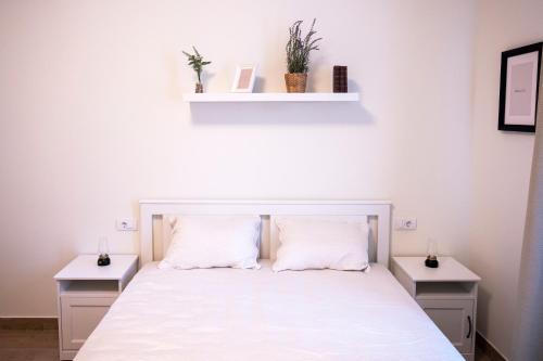 Katil atau katil-katil dalam bilik di Pop luxury apartments
