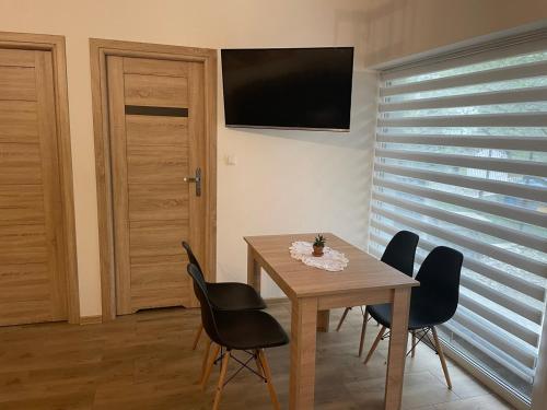 Μια τηλεόραση ή/και κέντρο ψυχαγωγίας στο Apartamenty Aleksandra