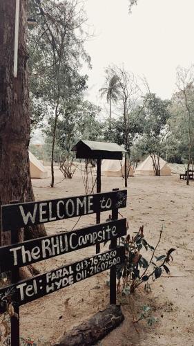 a sign that says welcome to thimphu camp at Rustika Glamping in Kampong Tanjong Che Lahom