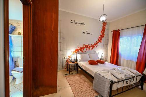 A bed or beds in a room at Popi's House