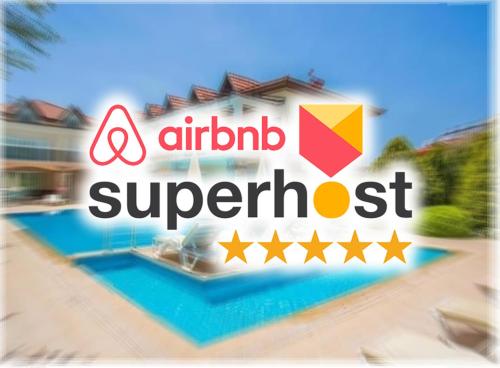 ein Zeichen für ein Luftattribut, ergänzt durch Sterne in der Unterkunft Olivia Apartment at Ölüdeniz - Central in Oludeniz