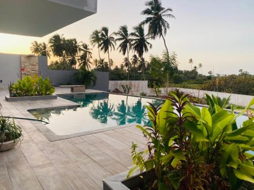 Kolam renang di atau dekat dengan Vila Kite Lagoon