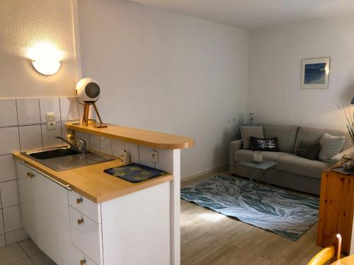 Η κουζίνα ή μικρή κουζίνα στο SUNSET 3 pieces centre Moulleau 50 m de la plage