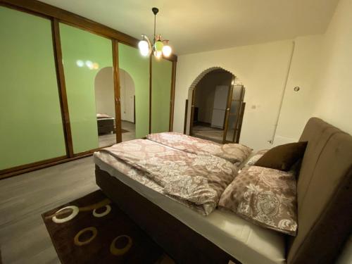 Postel nebo postele na pokoji v ubytování Apartment Mimo