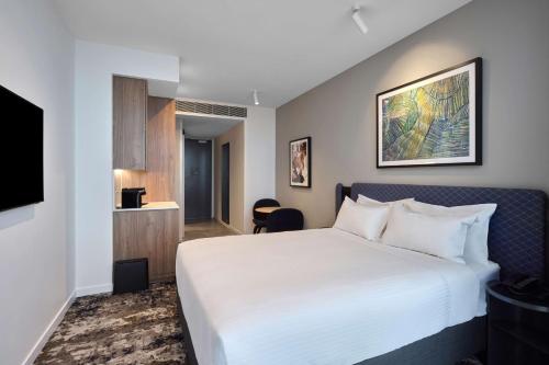 Un ou plusieurs lits dans un hébergement de l'établissement Adina Apartment Hotel Melbourne, Pentridge