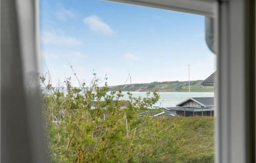 a view of a lake from a window at 2 Bedroom Cozy Home In Lemvig in Lemvig