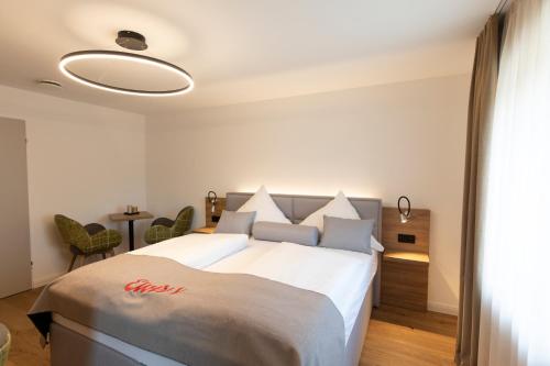 Krevet ili kreveti u jedinici u okviru objekta Waldhotel am Wittenheimer Forst