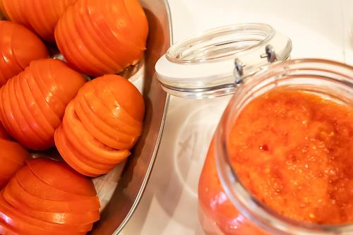 a jar of sauce next to a tray of carrots at Hotel ibis Porto Gaia in Vila Nova de Gaia