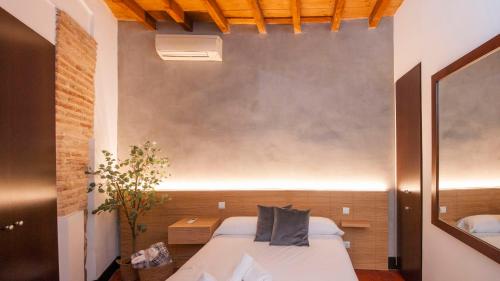 Posteľ alebo postele v izbe v ubytovaní El Patio del Regidor