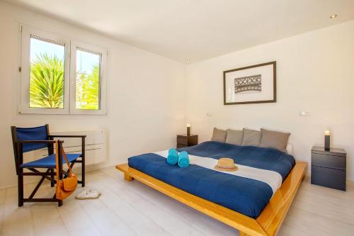 Postel nebo postele na pokoji v ubytování Casa Pura - Luxuriöses Ferienhaus mit Meerblick