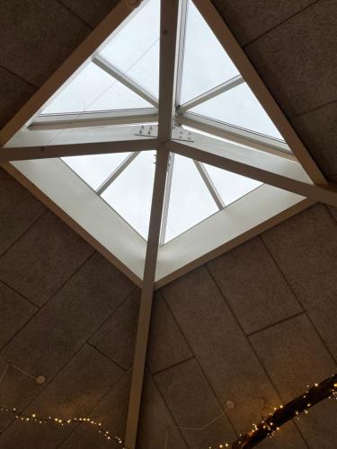 a skylight in the ceiling of a building at Room 6 - Hawkraft Kulturhotel in Vestervig