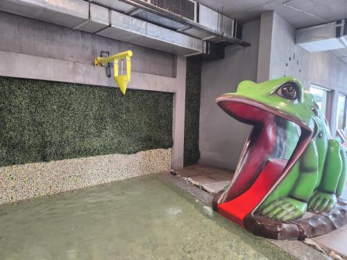 a water park with a frog on a slide at The Five Elements Hotel and SPA in Sapareva Banya