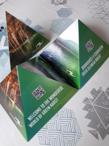 two brochures for a mountain resort for the holidays at Tourist Farm Znidarjevi in Kožljek