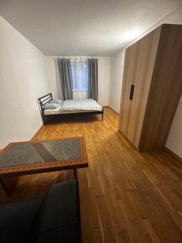 Ένα ή περισσότερα κρεβάτια σε δωμάτιο στο ORIGO Rooms and Apartments