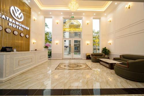 a lobby of a hotel with a waiting area at Cat Ba Wonder Hotel in Cat Ba