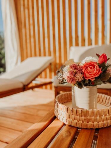 a vase of flowers sitting on a table at Diamond Coast Mobile Home in Drage