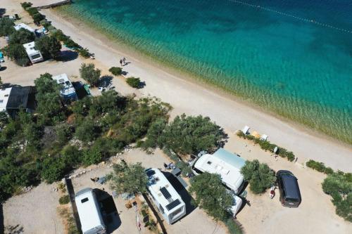 an aerial view of a rv park on a beach at Diamond Coast Mobile Home in Drage