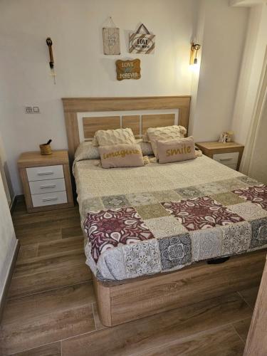 A bed or beds in a room at "Corner of happiness"