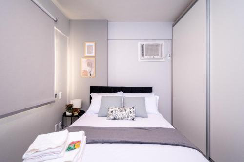 A bed or beds in a room at O lugar perfeito para sua estadia em Goiânia