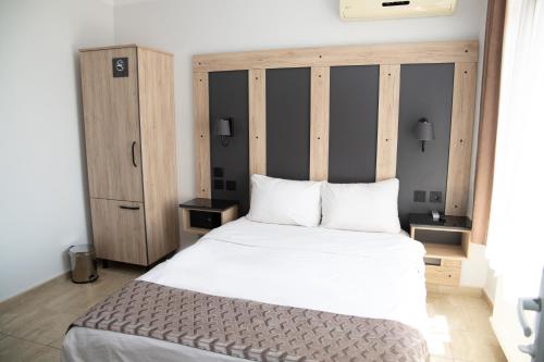 Ένα ή περισσότερα κρεβάτια σε δωμάτιο στο Galley Hotel