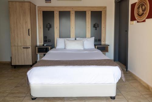 Ένα ή περισσότερα κρεβάτια σε δωμάτιο στο Galley Hotel