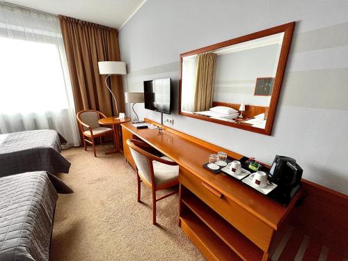 TV a/nebo společenská místnost v ubytování City Hotel