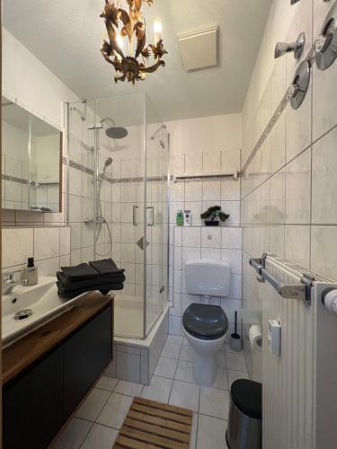 Ванна кімната в Sweet Home cozy Dresden Apartment three