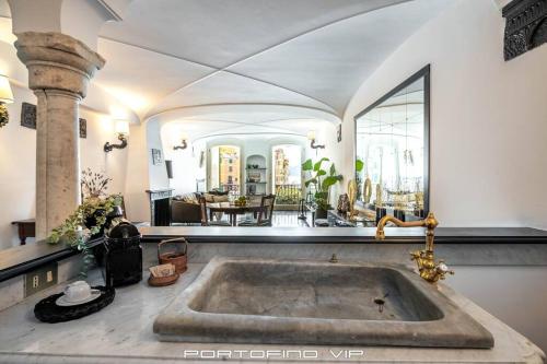 a large bathroom with a large tub in a room at Portofino Luxury Front Marina by PortofinoVip in Portofino