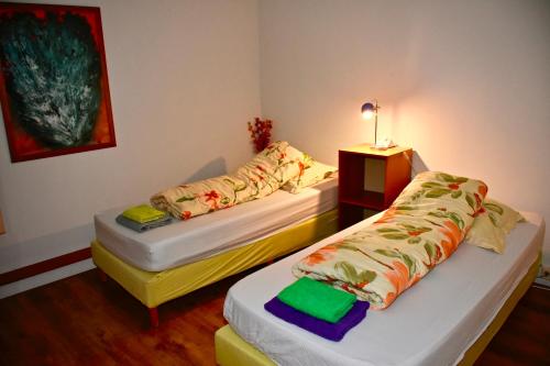 A bed or beds in a room at Het Melkhuis op prachtig Landgoed Koepeltjesplaats