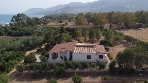 an aerial view of a house on a hill at Veranda Piau in Tertenìa