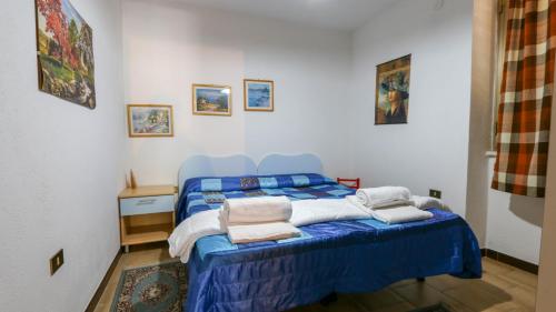 Säng eller sängar i ett rum på Welcomely - Country House Perda e Testa