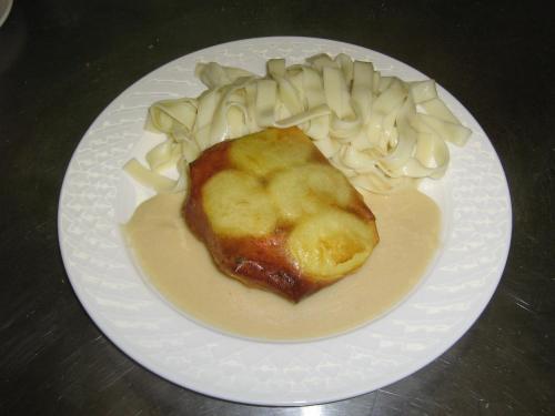 a plate of food with pasta on a table at Le Lion D'or in Ouroux en Morvan