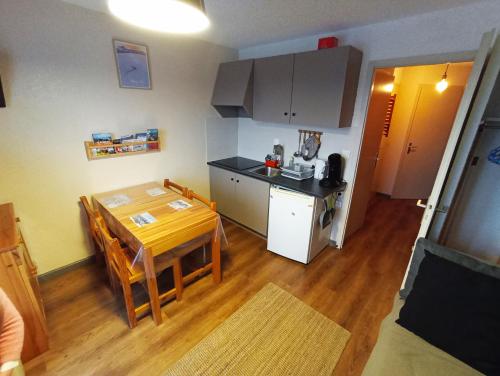 Η κουζίνα ή μικρή κουζίνα στο Appartement T2 idéal pour une famille