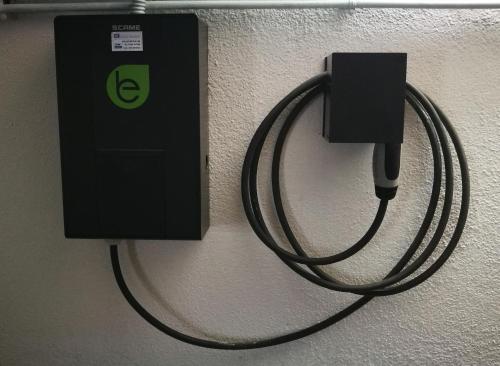 a electrical outlet with a cord plugged into it at Hôtel Alexandra in Roquebrune-Cap-Martin