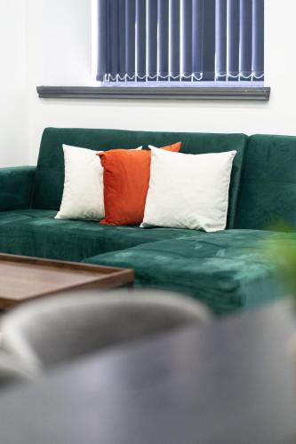 Foto New Zealand House Apartments by Happy Days 3