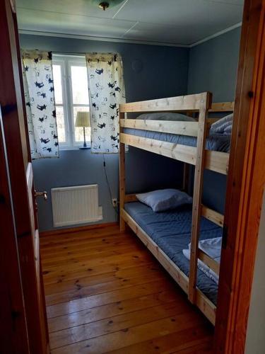 Postel nebo postele na pokoji v ubytování Lägenhet i Mörrum. Fiske