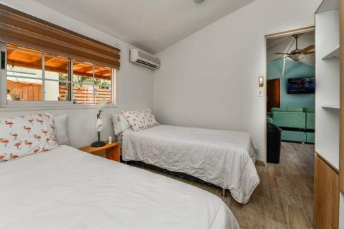 Ένα ή περισσότερα κρεβάτια σε δωμάτιο στο Vacation home Canucku
