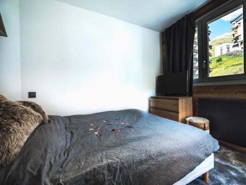Posteľ alebo postele v izbe v ubytovaní Charmant appartement ski aux pieds avec balcon à Tignes Le Val Claret - FR-1-502-358