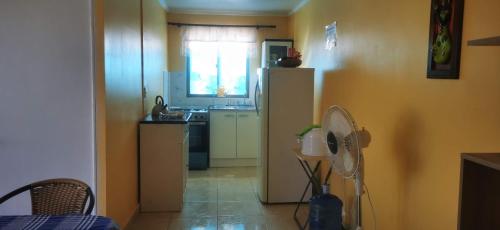 Köök või kööginurk majutusasutuses Cabaña Oasis de Pica